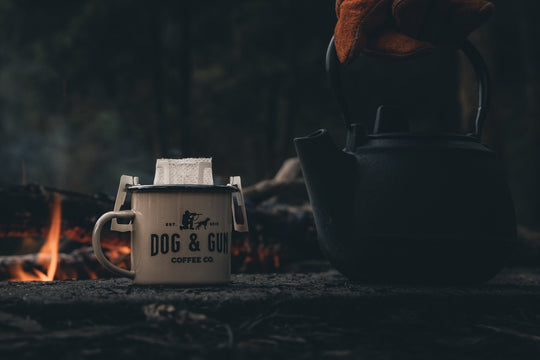 Dog & Gun Enamel Mug on the fire